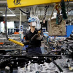 Japan's Private Sector Output Falls Back To Contraction Amid Reimposition Of State Of Emergency